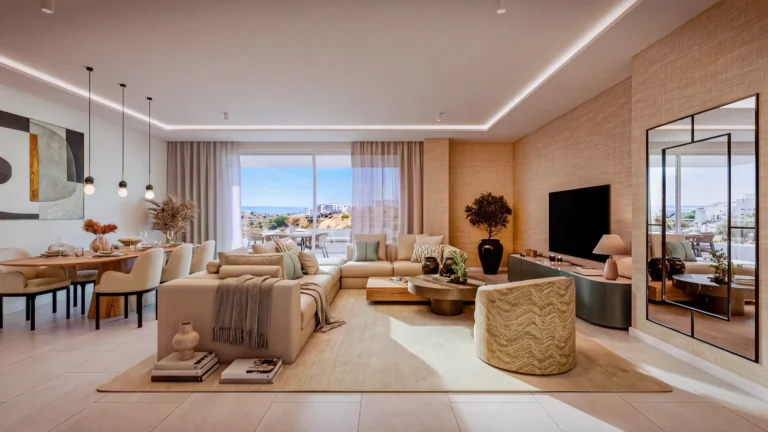 Séjour lumineux avec grandes baies vitrées et vue mer dans un logement de Tempo