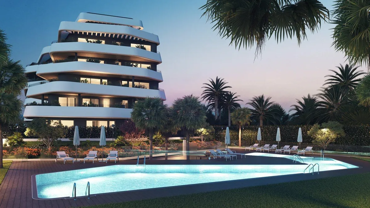 Pool set among gardens at Habitat Alboran Bora Torremolinos
