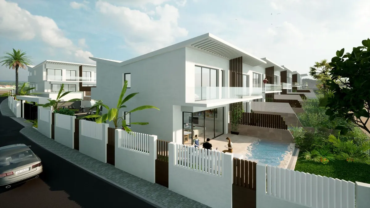 Terrasse avec piscine à débordement d'une villa de La Cala Valley